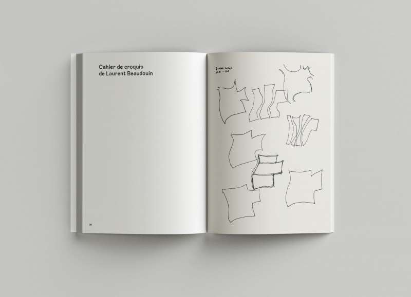 Livre de la médiathèque de Grasse ouvert sur une double page de croquis d'Ivry Serres, révélant l'approche architecturale et artistique du projet.